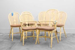 A set of ten white painted Windsor chairs,