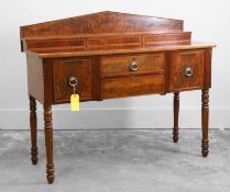 A Regency mahogany side board
