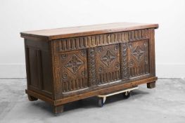 A carved oak coffer,