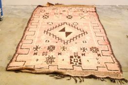 A Moroccan wool rug,