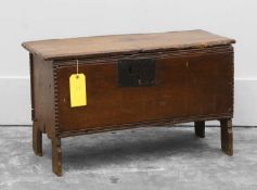 An oak panelled coffer,