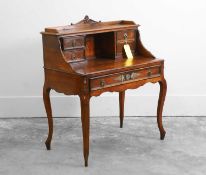 An Empire style mahogany and gilt metal mounted desk