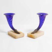 A pair of Victorian blue glass cornucopia vases,