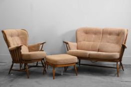 An Ercol two-seater settee,