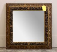 A gilt gesso and composition mirror