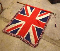 A Union Jack ceremonial flag,