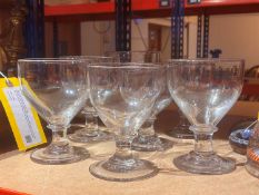 A group of seven plain glass rummers,