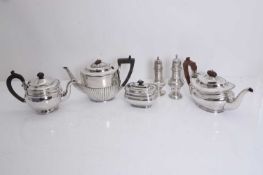 A collection of silver items,