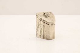 A silver tea canister,