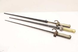Three socket bayonets,