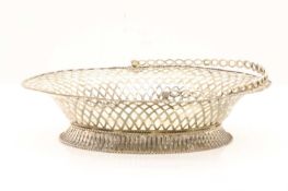 A George III silver pierced basket,