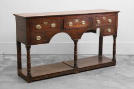 A George III oak dresser base,