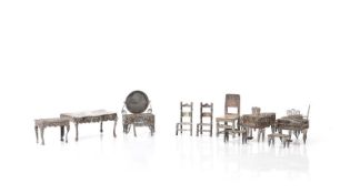 A set of filigree white metal dolls house furniture,