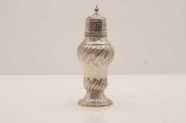 A silver sugar castor,