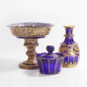 A collection of gilt blue glass,