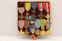 A collection of French war medals,