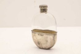 A silver mounted glass hip flask,