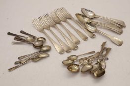 A collection of flatware,