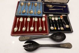 A collection of four cased silver sets,