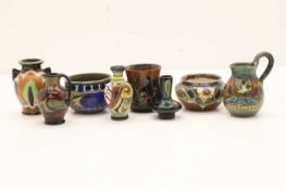 A collection of eight miniature Gouda ceramics,