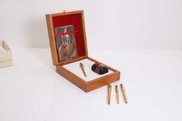 A collection of four pens,