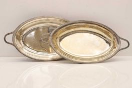 A pair of George III silver tureens,