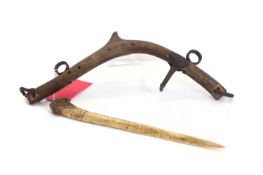 An antler carved for reigns,