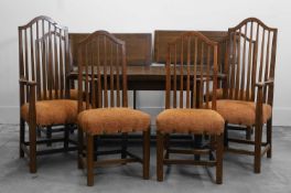 A Gordon Russell oak draw leaf dining table,