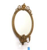 A pair of gilt gesso girandole mirrors,