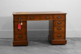 A Victorian walnut pedestal desk,