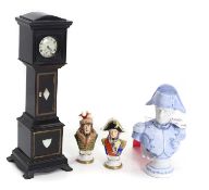 An ebonised watch case,