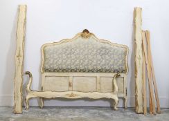 A painted wooden double bed,