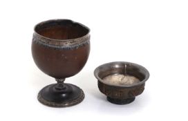 A pair of silver mounted cups,