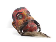 A Mexican papier mache mask,