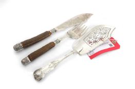 A silver fish slice,