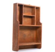 A spice rack with jars,