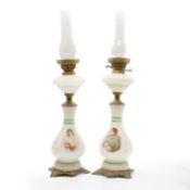 A pair of opaline glass oil lamps,