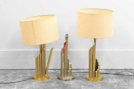 A pair of brass and steel table lamps,