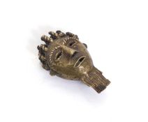 An Ashanti weight in the form of a head,
