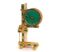 A Schmid Brutalist gilt metal and faux malachite mantel timepiece.