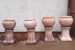 Four Lefco glazed jardinières and stands,