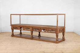 A long oak display cabinet,