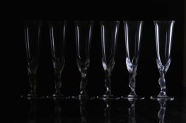 A set of twelve Igor Carl Faberge crystal champagne flutes,