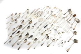 A collection of silver flatware,
