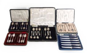 A collection of cased silver flatware,