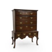 A George I oak chest on stand,