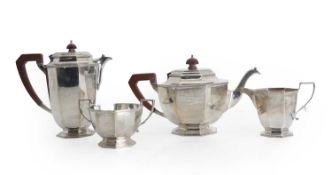 A four silver piece tea service,