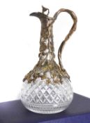 A glass and silver mounted decanter,