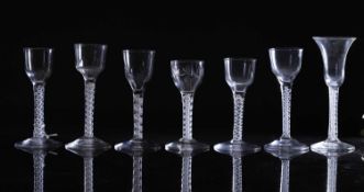 A group of seven opaque-twist wine glasses,