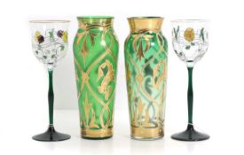 A pair of Czech iridescent and gilt glass vases,